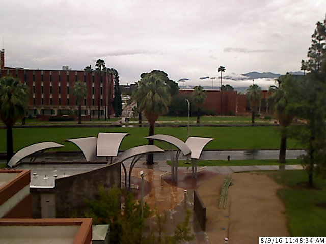 Webcam showing dark clouds and rain at University of Arizona in Tucson late Tuesday morning (8/9/2016). While the campus was open, the university advised students not to come to campus due to the heavy rain and poor road conditions in the area.