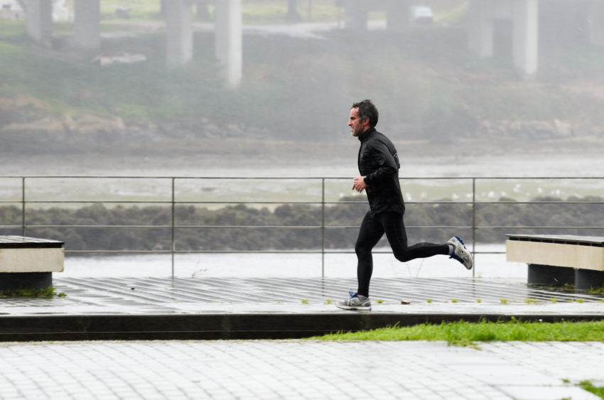 A man running in the rain (c) mimohe / shutterstock