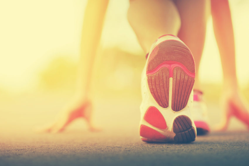 Runner feet running on street (c) KP Photograph / shutterstock